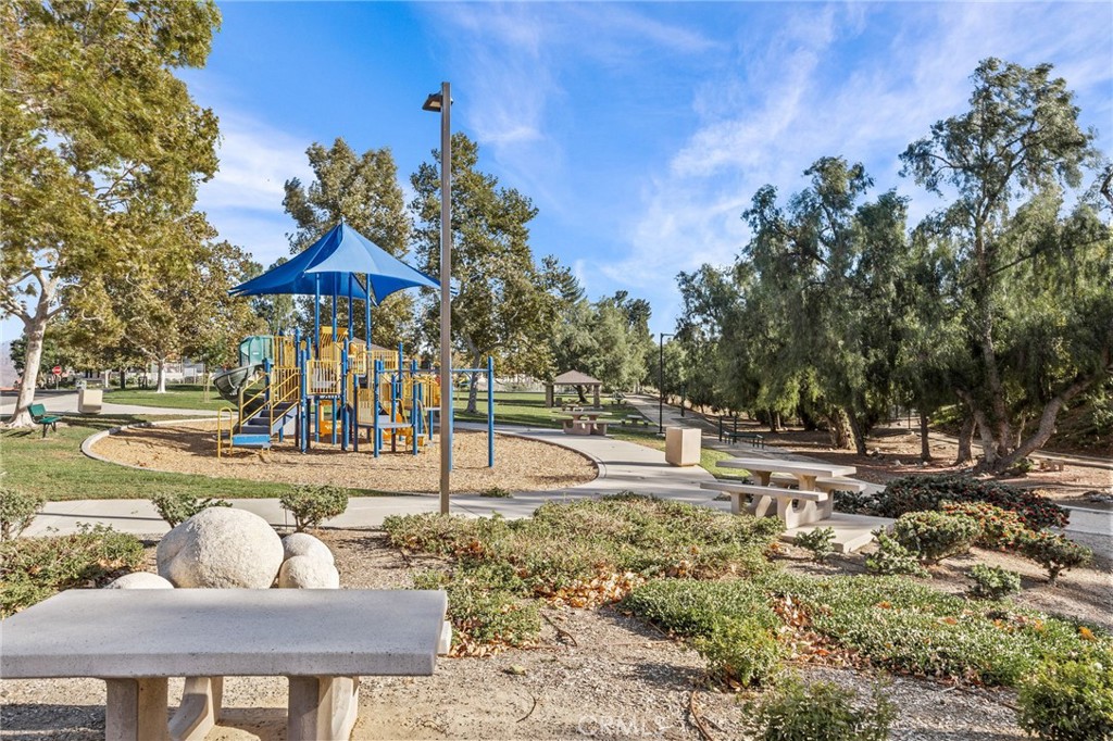 8992 Dahlia Drive Corona, CA 92883 - Photo 37 of 38 a view of a yard with plants and trees