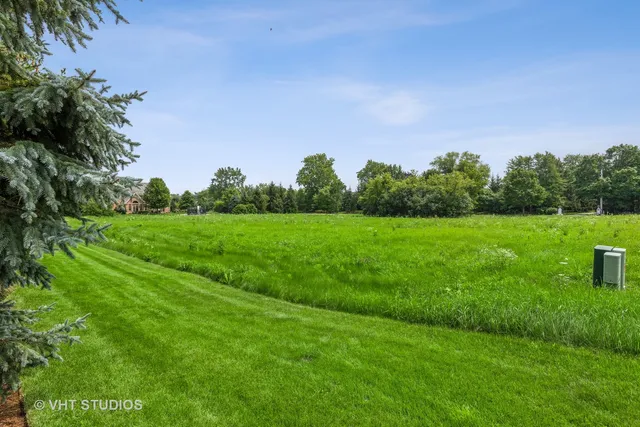 a view of a golf course with a garden