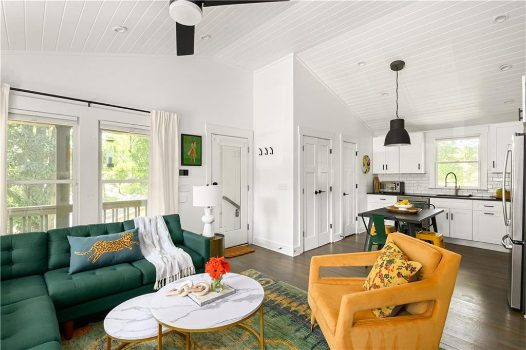 347 Sinclair Avenue Northeast Atlanta, GA 30307 - Photo 11 of 32 a living room with furniture fireplace and window