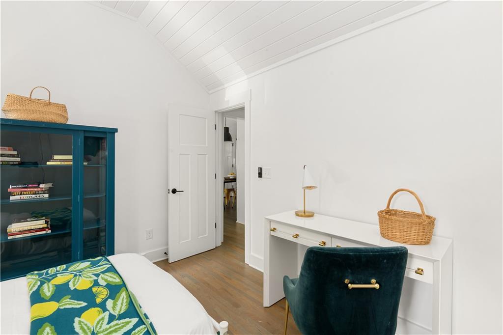 347 Sinclair Avenue Northeast Atlanta, GA 30307 - Photo 21 of 32 a bedroom with a bed and a dresser