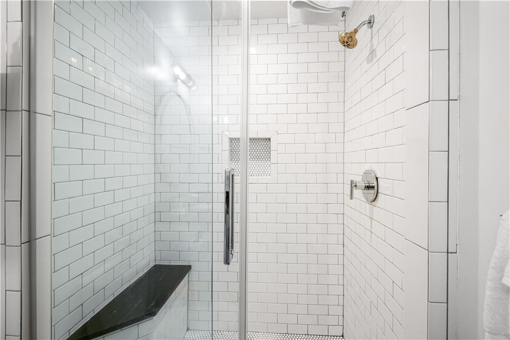 347 Sinclair Avenue Northeast Atlanta, GA 30307 - Photo 27 of 32 a bathroom with a shower