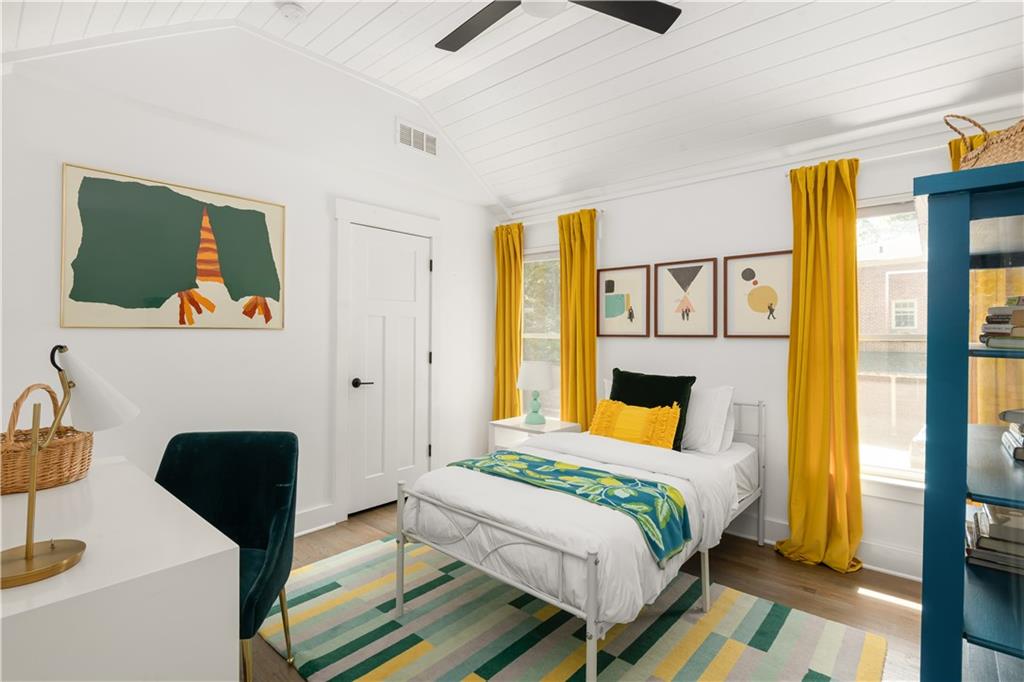 347 Sinclair Avenue Northeast Atlanta, GA 30307 - Photo 4 of 32 a bedroom with a bed and a window