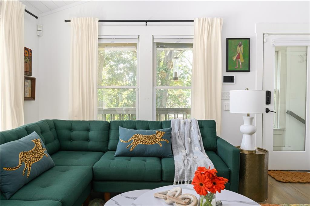 347 Sinclair Avenue Northeast Atlanta, GA 30307 - Photo 7 of 32 a living room with furniture and a window