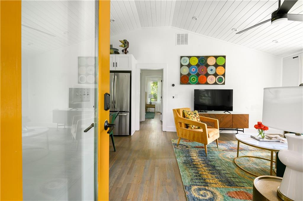 347 Sinclair Avenue Northeast Atlanta, GA 30307 - Photo 10 of 32 a living room with furniture and a flat screen tv