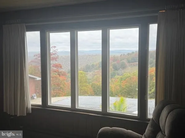 a kitchen with a sink cabinets and window