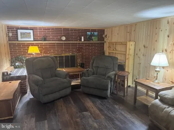 a bedroom with a bed and a mirror