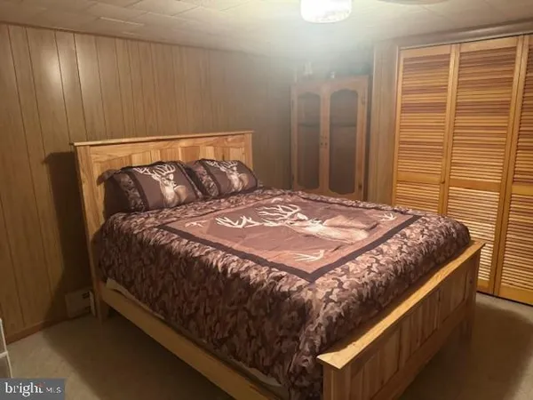 a view of a dry yard with a mountain