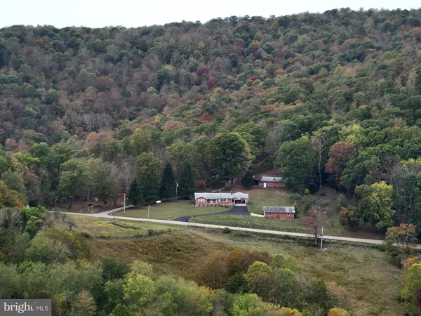 a front view of a house with a garage