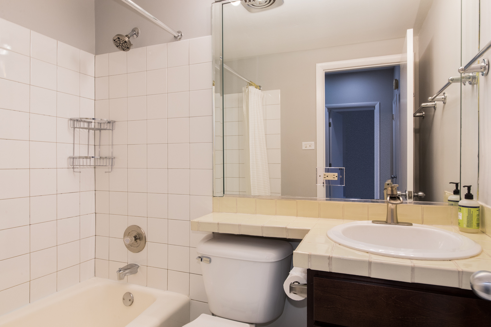 648 West Belden Avenue, Unit B Chicago, IL 60614 - Photo 18 of 24 a bathroom with a sink a toilet and shower