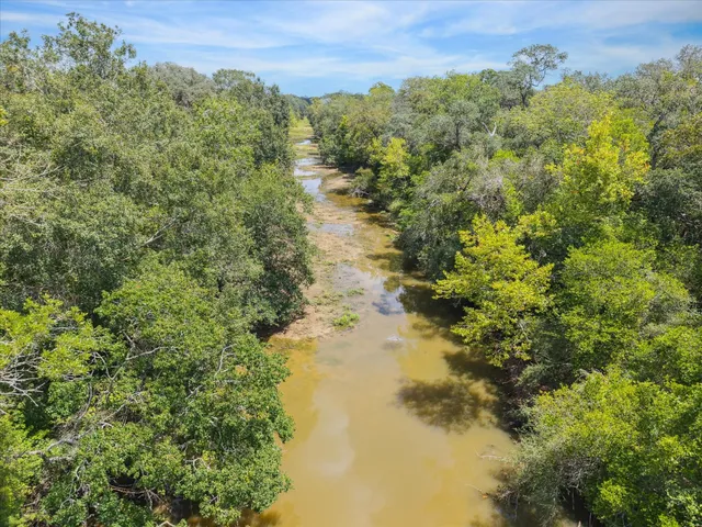 a view of a lake with mountains in the background