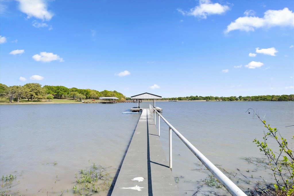 2776 Waters Edge Quinlan, TX 75474 - Photo 20 of 28 a view of outside space and a lake view
