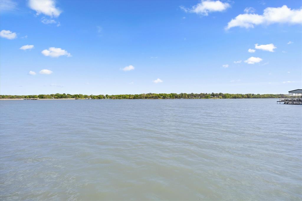 2776 Waters Edge Quinlan, TX 75474 - Photo 23 of 28 a view of outside space and a lake view