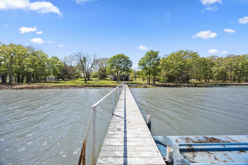 2776 Waters Edge Quinlan, TX 75474 - Photo 24 of 28 a view of outdoor space and yard