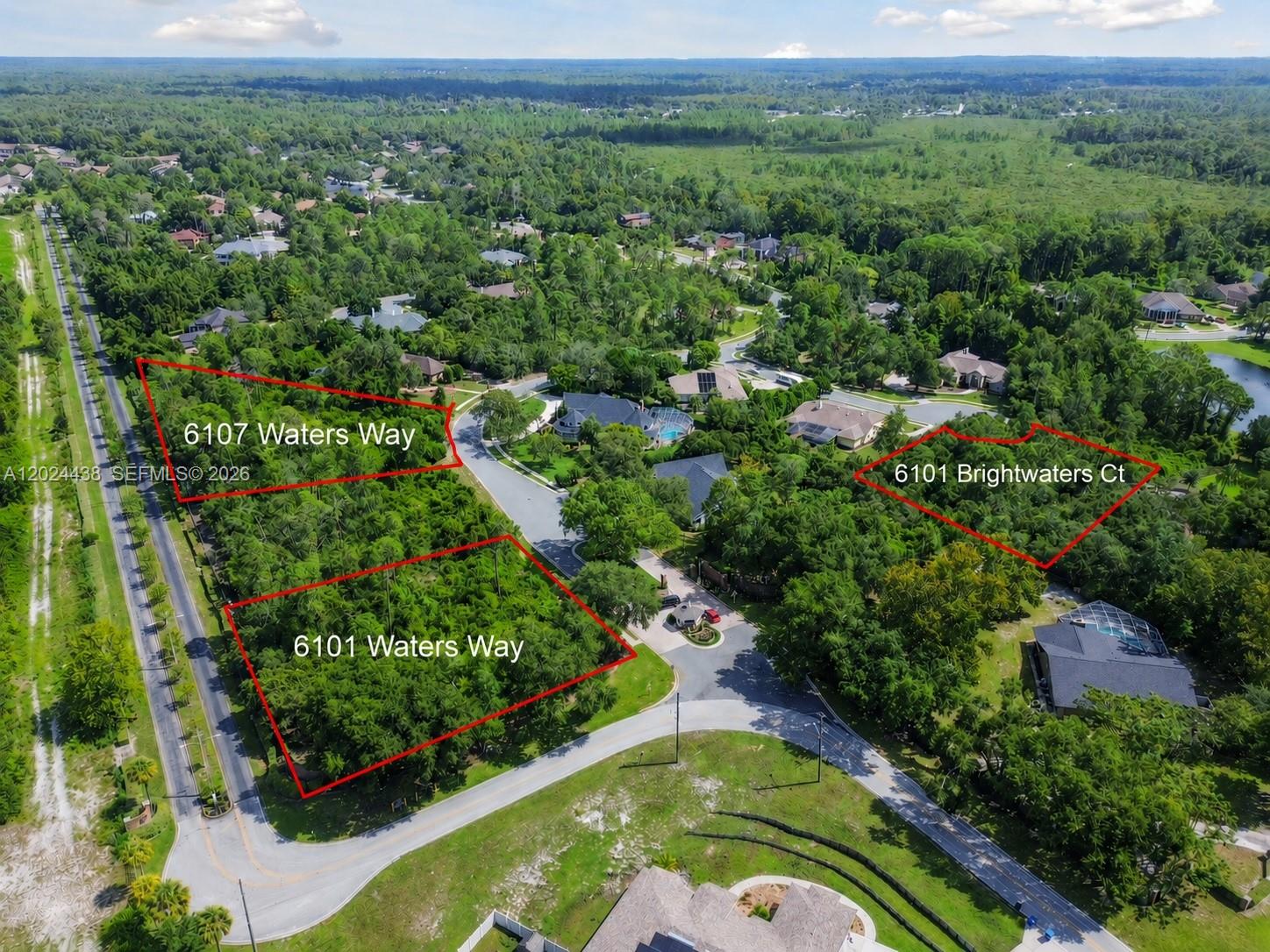 6107 Waters Way Spring Hill, FL 34607 - Photo 1 of 2 an aerial view of a house with a yard
