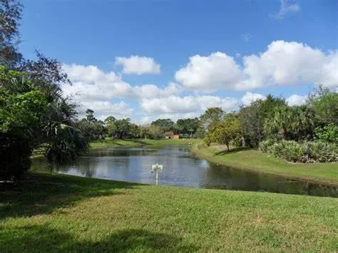 a view of a lake with a big yard