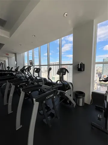 a view of a balcony with chairs