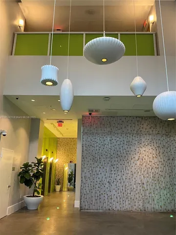 a view of house with a yard