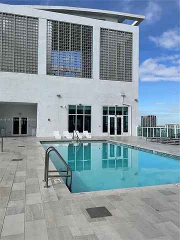 a view of roof deck with wooden floor and barbeque oven