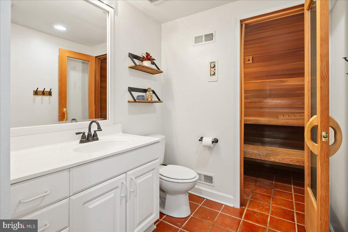 3012 Russell Road Alexandria, VA 22305 - Photo 39 of 56 a bathroom with a sink a toilet and shower