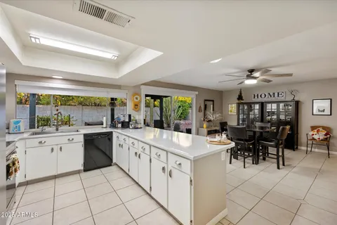 a view of a living room and dining room