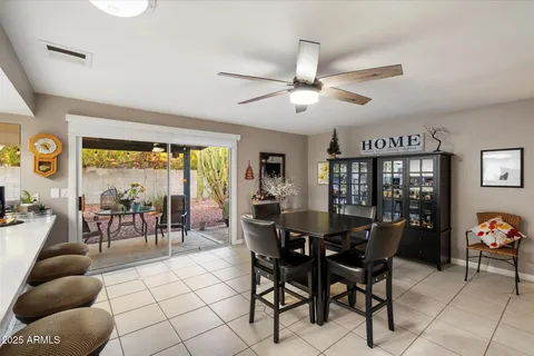 a view of a dining room with furniture and a livingroom