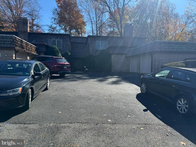 a view of a car parked on the side of the road
