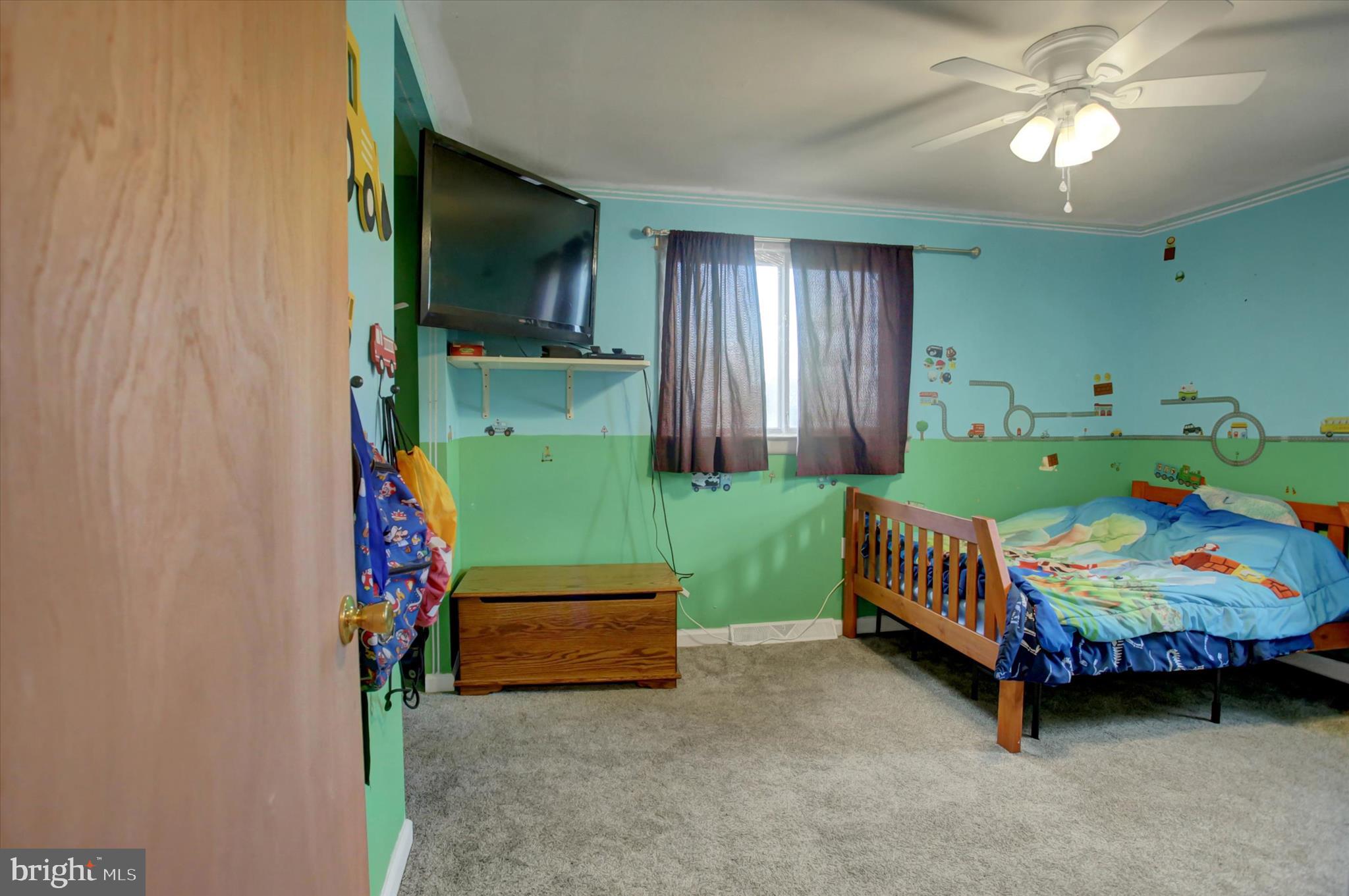 2688 Rocky Spring Road Chambersburg, PA 17201 - Photo 15 of 36 a bedroom with furniture and a window