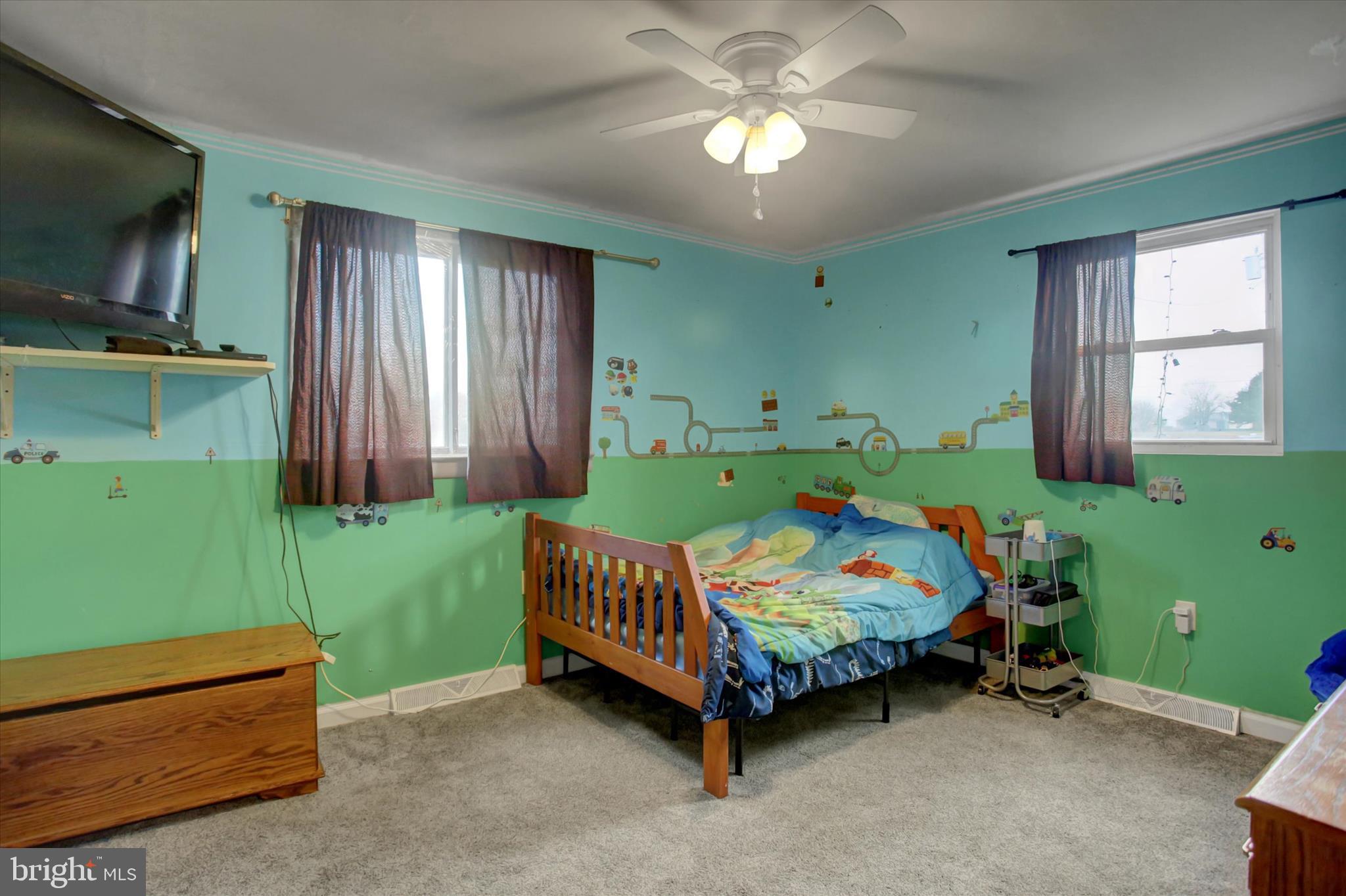2688 Rocky Spring Road Chambersburg, PA 17201 - Photo 16 of 36 a bedroom with a bed and windows