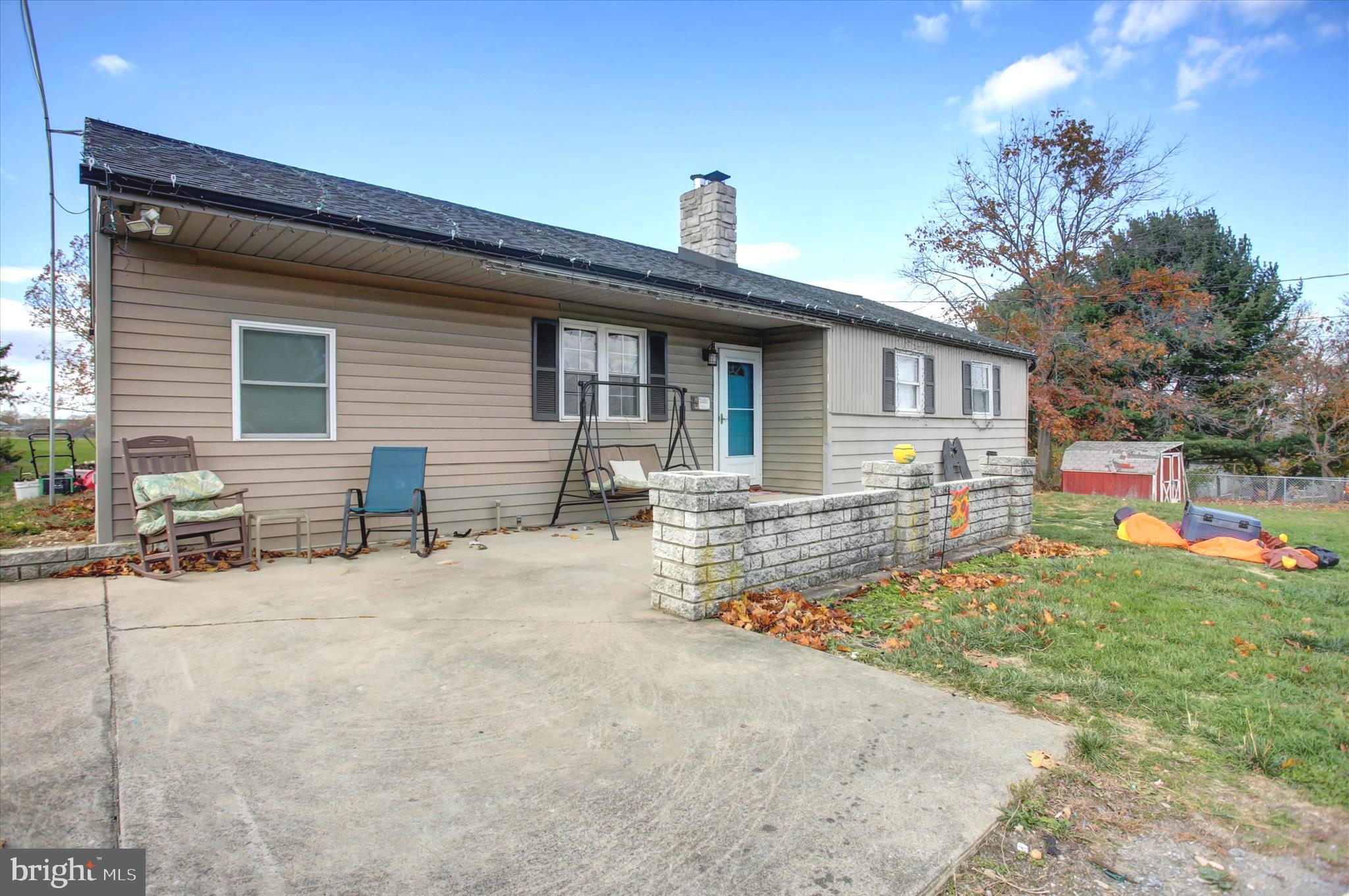2688 Rocky Spring Road Chambersburg, PA 17201 - Photo 5 of 36 a front view of house with yard