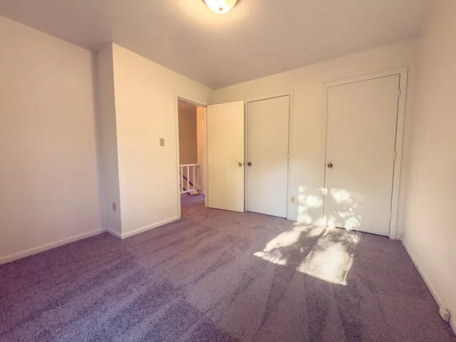 a view of a livingroom with wooden floor