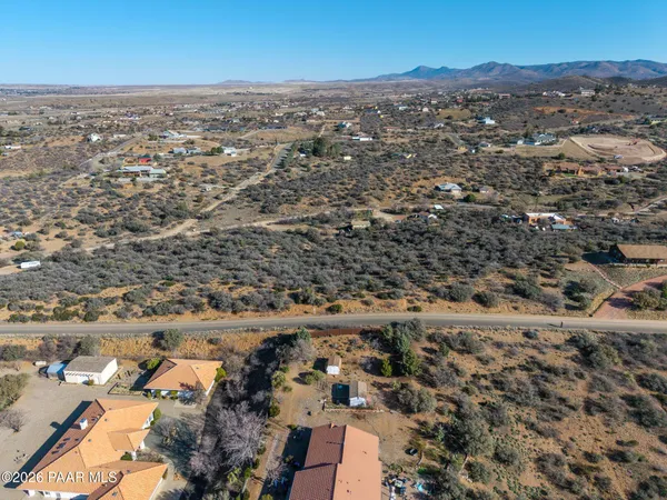 an aerial view of residential building and trees