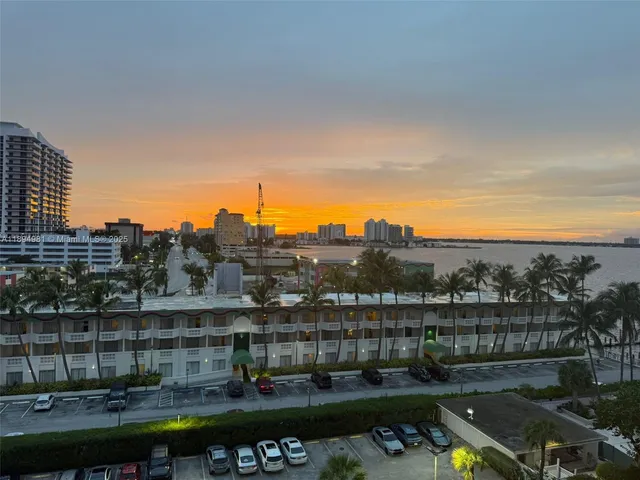 a view of a lake with a city