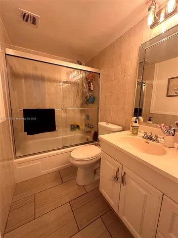 a bed room with a bed and a couch