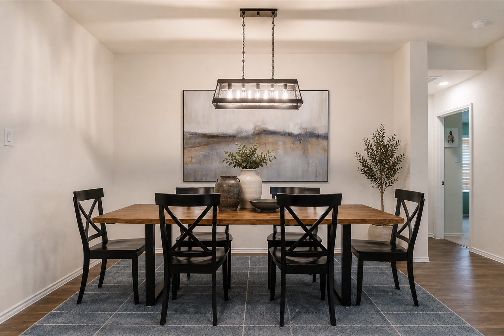 262 Sickle Loop Kyle, TX 78640 - Photo 6 of 20 An inviting dining area offers seamless flow, perfect for entertaining.
