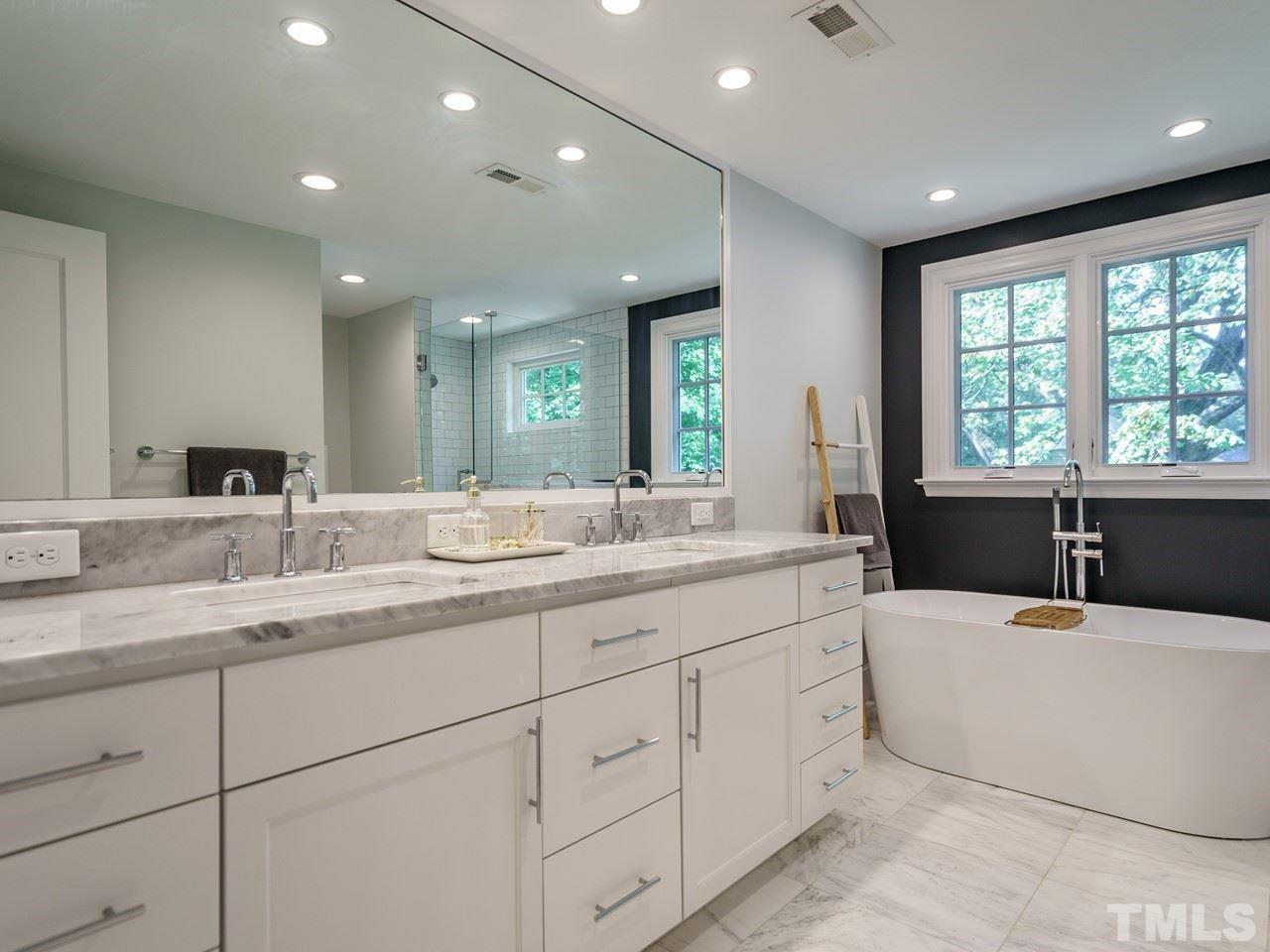1703 Fairview Road Raleigh, NC 27608 - Photo 20 of 30 a large bathroom with double vanity and mirrors