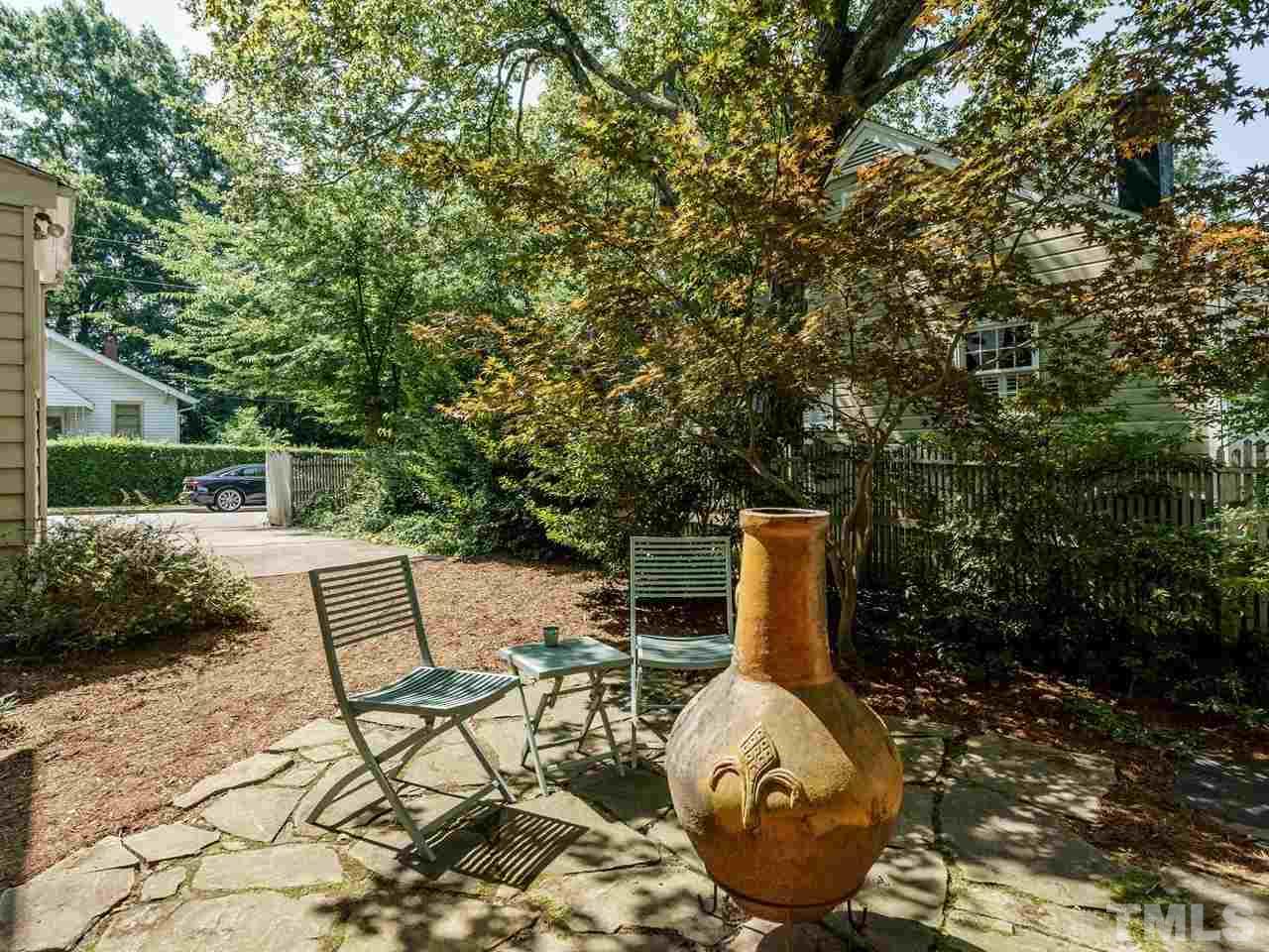 1703 Fairview Road Raleigh, NC 27608 - Photo 29 of 30 a view of backyard with furniture and garden