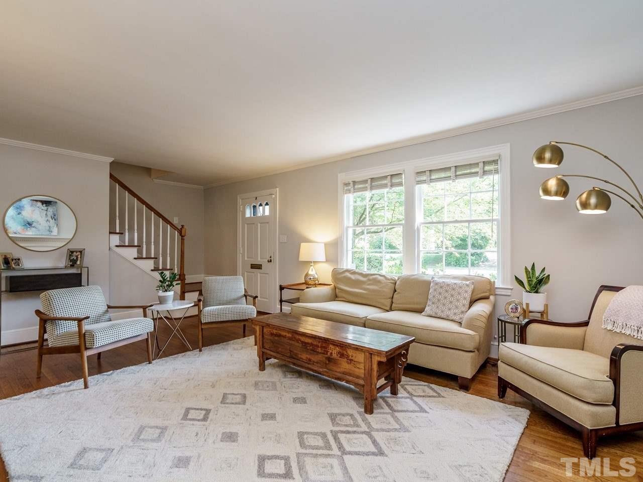 1703 Fairview Road Raleigh, NC 27608 - Photo 6 of 30 a living room with furniture and a window