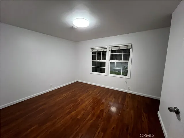 a kitchen with granite countertop a stove a sink and a granite counter tops