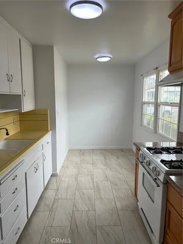 an entryway with wooden floor