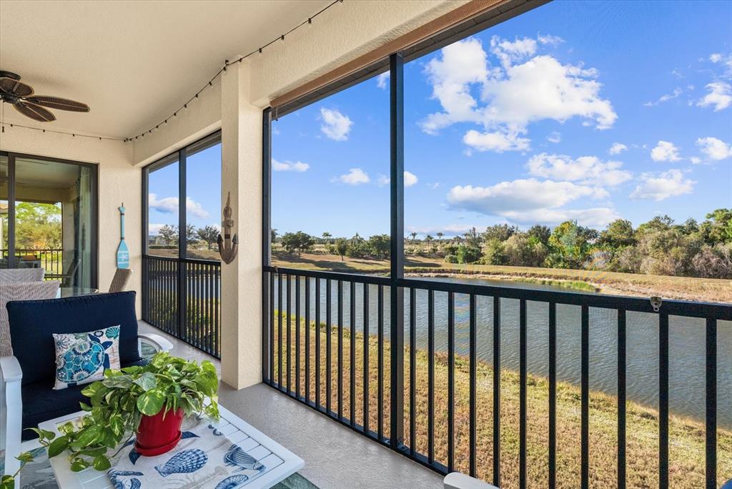 20080 Ragazza Circle, Unit 202 Venice, FL 34293 - Photo 25 of 51 a view of a balcony with a potted plant