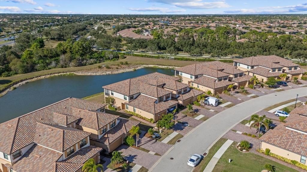 20080 Ragazza Circle, Unit 202 Venice, FL 34293 - Photo 32 of 51 an aerial view of a city with ocean view