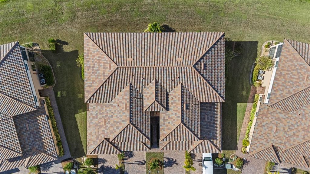 20080 Ragazza Circle, Unit 202 Venice, FL 34293 - Photo 34 of 51 an aerial view of a house