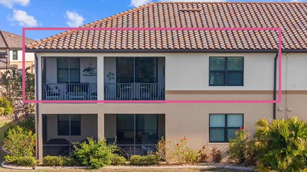 20080 Ragazza Circle, Unit 202 Venice, FL 34293 - Photo 40 of 51 a front view of a house