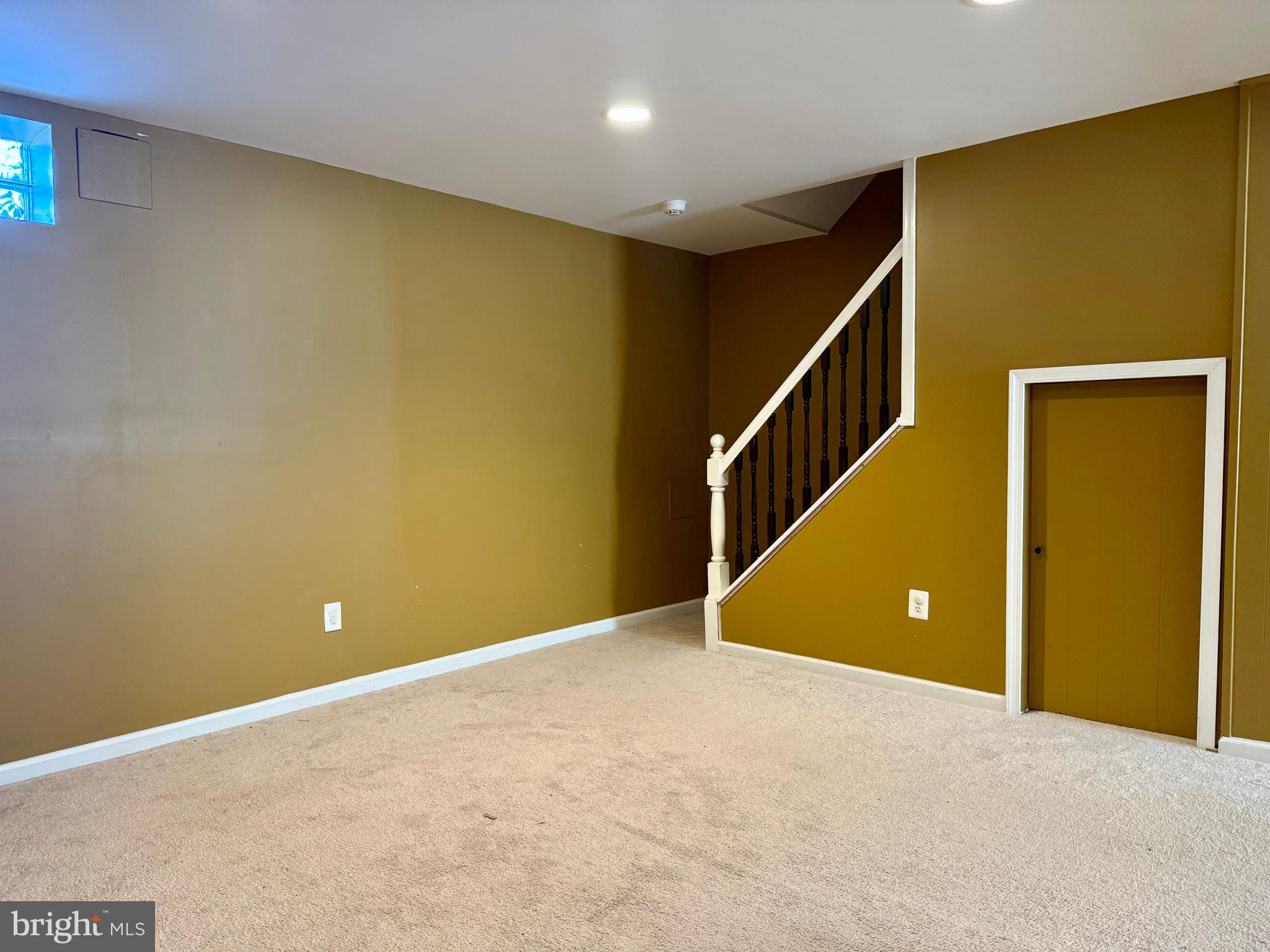 9613 Conmar Road Baltimore, MD 21220 - Photo 20 of 28 a view of an empty room with wooden floor