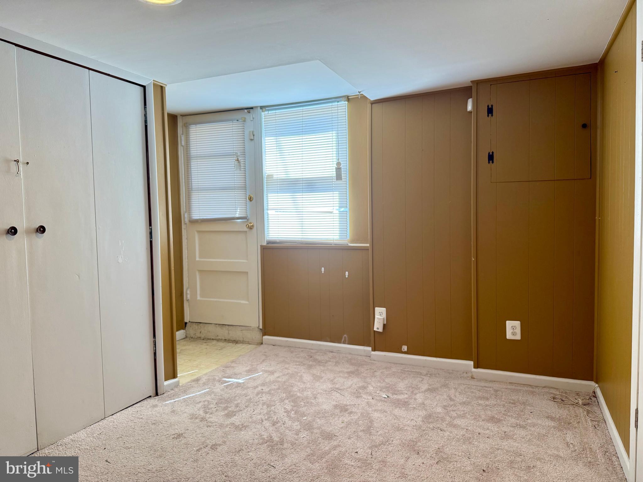 9613 Conmar Road Baltimore, MD 21220 - Photo 24 of 28 an empty room with windows and closet