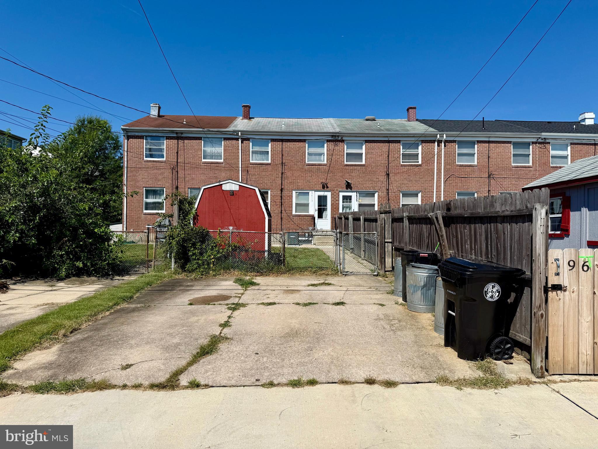 9613 Conmar Road Baltimore, MD 21220 - Photo 26 of 28 a front view of a house with a yard