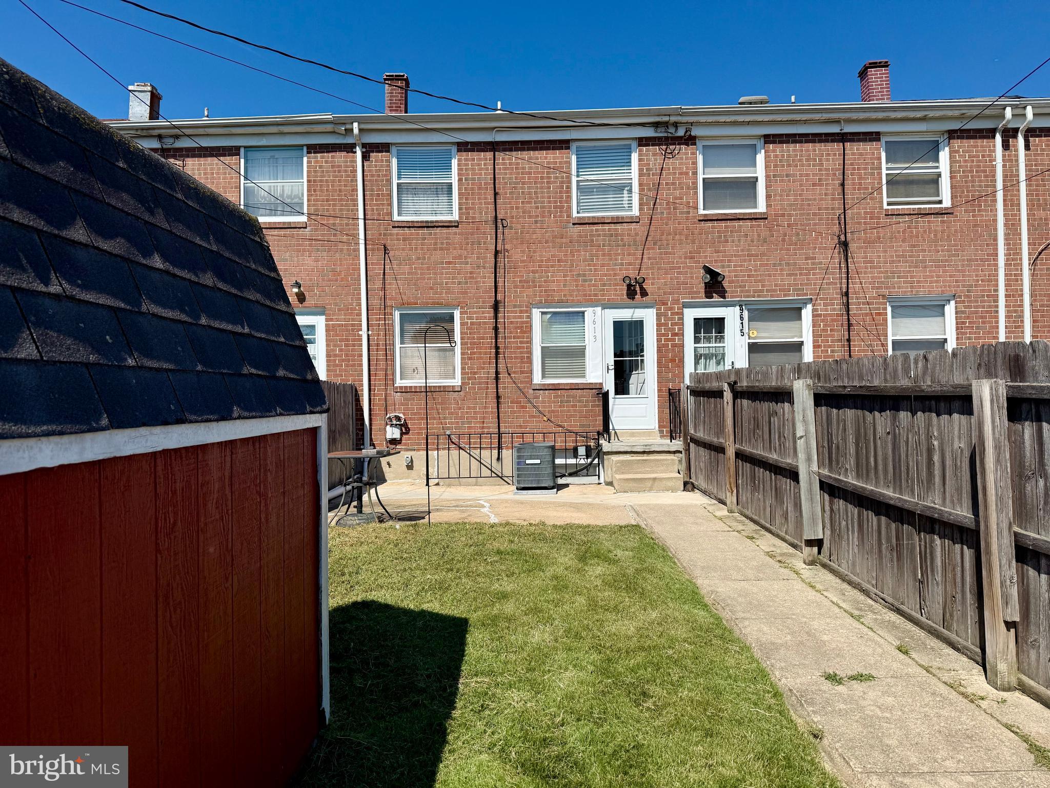 9613 Conmar Road Baltimore, MD 21220 - Photo 27 of 28 a view of a house with wooden floor and a yard