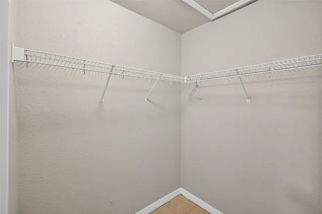 a view of a room with racks on the wall