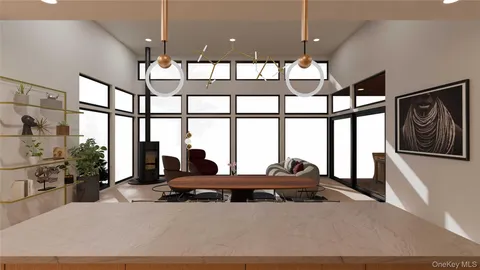 a living room with large windows