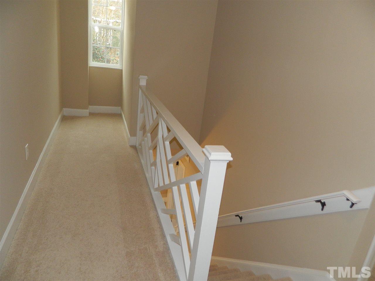 3824 Old Coach Road Raleigh, NC 27616 - Photo 13 of 25 a view of a hallway to rooms